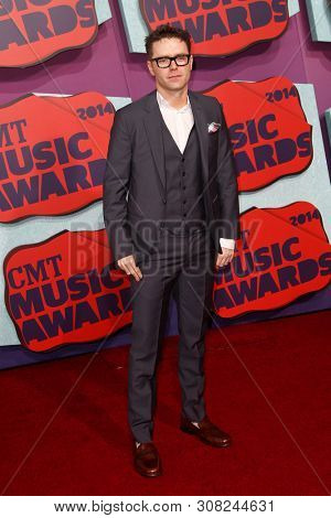 NASHVILLE, TN-JUNE 4: Morning radio host Bobby Bones attends the 2014 CMT Music Awards at the Bridgestone Arena on June 4, 2014 in Nashville, Tennessee.