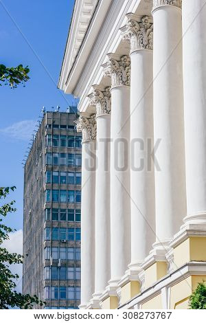 Front Of Old Buildig With Columns And Skyscrapper On Background. Alexander Butlerov Chemistry Instit