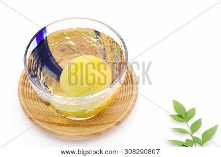 Japanese Plum Wine Called Umeshu On White Background
