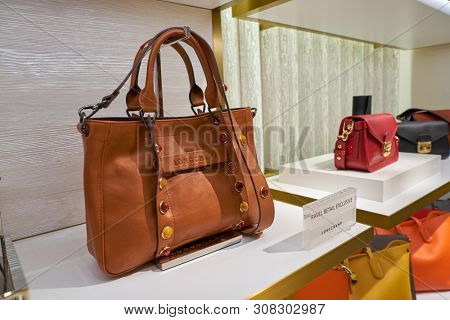 HONG KONG, CHINA - CIRCA APRIL, 2019: bags on display at Longchamp store in Hong Kong International Airport. 