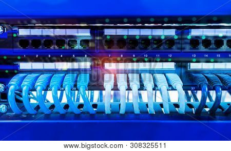 network cable connecting on network core switch close up
