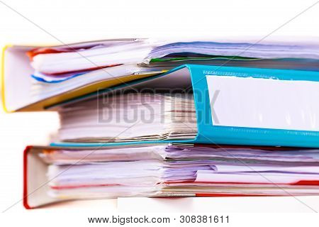 Paperwork. Stack Of File Folders, Ring Binders On Office Table Dask.