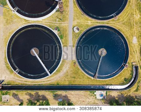 Modern Wastewater Treatment Plant, Top View From Drone, Sedimentation Drainage Tanks Round Form.