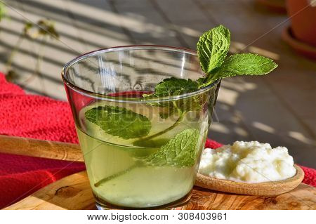 Water Kefir Drink With Fresh Mint Leaves. Probiotic Drink Without Dairy Products. Healthy Life Habit