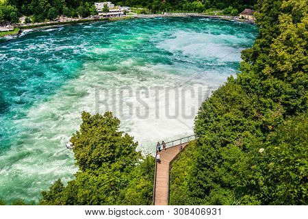 Neuhausen Am Rheinfall, Switzerland - 23 July 2019. Waterfall On The River Rhine In The City Neuhaus