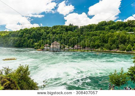Neuhausen Am Rheinfall, Switzerland - 23 July 2019. Waterfall On The River Rhine In The City Neuhaus