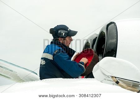Tyumen, Russia - June 19, 2019: Aircraft Repair Helicopter Utair Engineering Plant. Male Mechanic In
