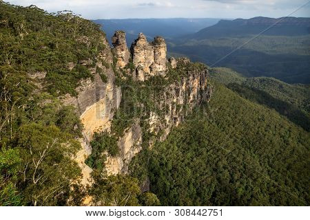 Three Sisters Rock Formation With Last Sunlight In The Blue Mountains, Katoomba, New South Wales, Au