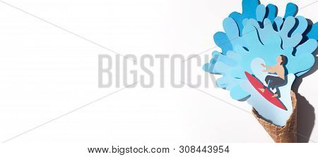 Sea Resort Concept With Serfer Inside Cone On White Background, Panorama, Copy Space, Paper Creative