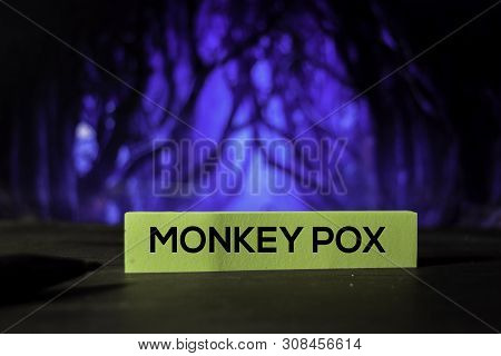 Monkey Pox On The Sticky Notes With Bokeh Background
