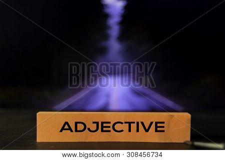 Adjective On The Sticky Notes With Bokeh Background