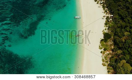 Tropical Landscape: Sandy Beach With Palm Trees And Turquoise Waters Of The Coral Reef Top View, Puk