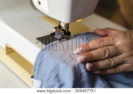 Sewing Machine. Work In The Light Of The Built-in Hardware Lamp. Steel Needle With Looper And Foot C
