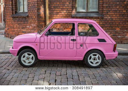 City Riga, Latvian Republic. Oldtimer Car Fiat 126 At Capital Riga.  Urban City View. Travel Photo. 