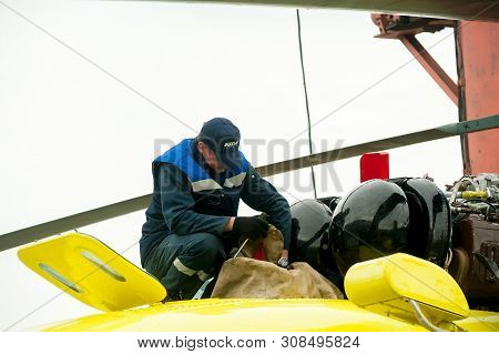 Tyumen, Russia - June 19, 2019: Aircraft Repair Helicopter Utair Engineering Plant. Male Mechanic In