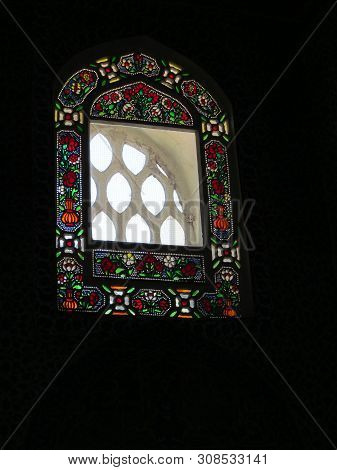 Stained Glass In The Frame Of The Upper Window Of The Topkapi Palace, Istanbul, Turkey