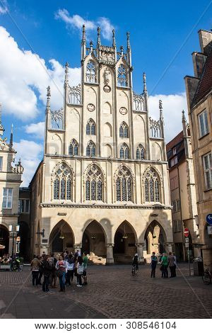 Munster, Germany - May 9: People On Street On May 9, 2013 In Munster, Germany. Largely Destroyed Dur