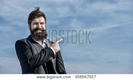 Project Manager. Businessman Against The Sky. Brutal Caucasian Hipster With Moustache. Mature Hipste