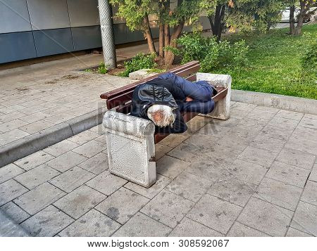 City Homeless On The Bench