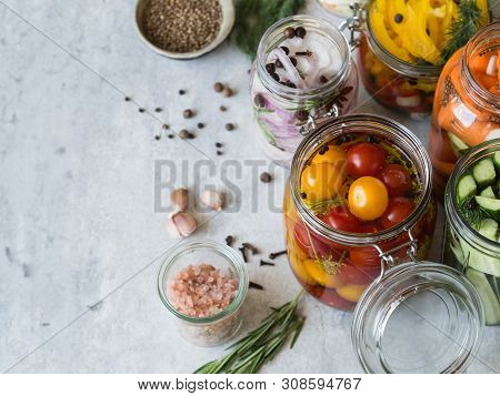 Pickled Vegetables. Salting Various Vegetables In Glass Jars For Long-term Storage. Preserves Vegeta