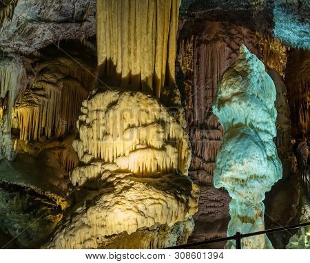 Stalactites And Stalagmites Underground In Cave System In Postojna