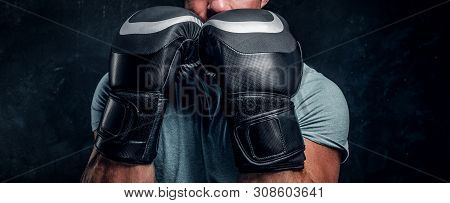 Man With Beautifully Muscular Body Is Ready For Fight, Swowing His Spectacular Hits.