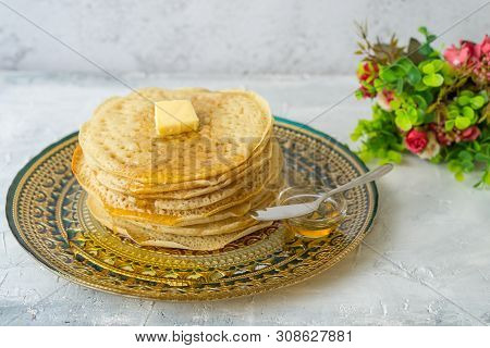 Moroccan Pancakes Baghrir  Beghrir Or Crapes With 1000 Holes Served With Honey And Butter On Grey Ba