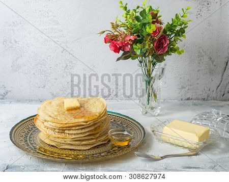 Moroccan Pancakes Baghrir Beghrir Or Crapes With 1000 Holes Served With Honey And Butter On Grey Bac