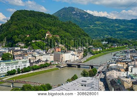 Salzburg, Austria, With Its Two Hills Kapuzinerberg And Gaisberg And The Salzach River As Seen From 