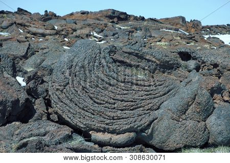 cooled lava flow ropy surface in Etna Park, Sicily