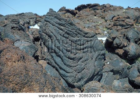 cooled lava flow ropy surface in Etna Park, Sicily
