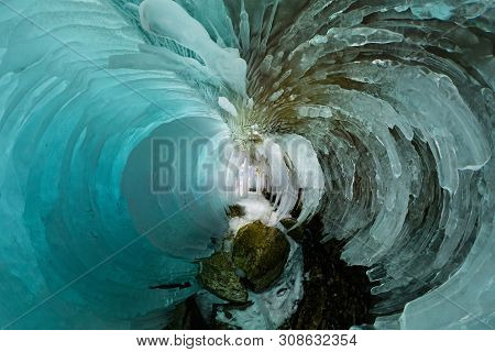Blue Ice Cave Grotto On Olkhon Island, Lake Baikal, Covered With Icicles. Tiny Little Planet 360