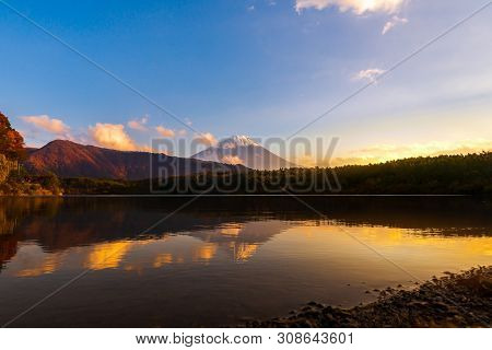 Beautiful Twilight Scenery Of Lake Saiko And Mountain Fuji During Autumn In Japan