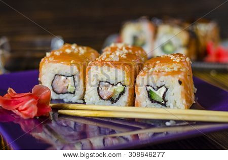 Ushi With Red Fish On A Purple Plate