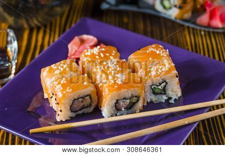 Ushi With Red Fish On A Purple Plate