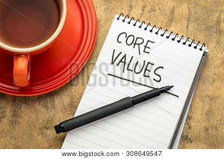 core values - handwiting in  a spiral notebook with a cup of tea