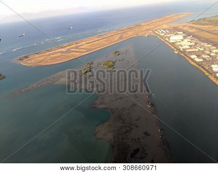 Honolulu - October 25, 2018: Aerial Of Airport Reef Runway, Planes And Plane Hangers At Honolulu Int