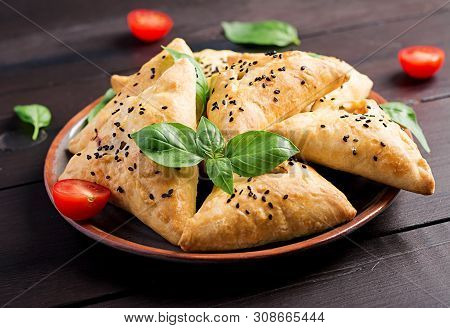 Asian Food. Samsa (samosa) With Chicken Fillet And Green Herbs On Wooden Background.