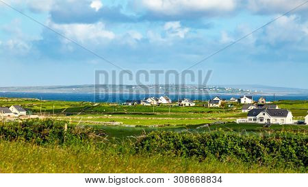 Beautiful Meadow, Farms And The Sea In The Background Near The Village Of Doolin, Wild Atlantic Way,