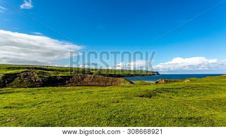 View Of A Meadow Green Next To Doolin Bay With The Cliff In The Background, Wild Atlantic Way, Irish