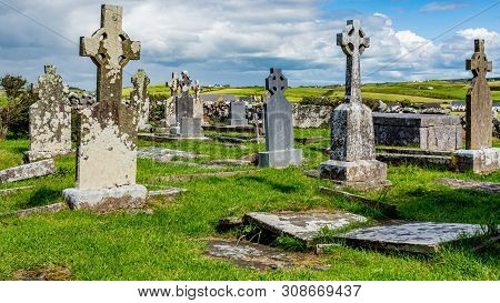 Tombs In Ruins Of The Graveyard Of The Medieval Church Of Killilagh In The Village Of Doolin, Beauti