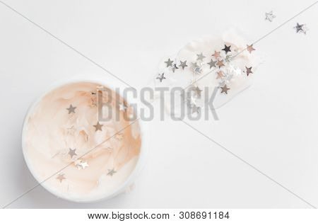 Microplastic In Cosmetics. Micro Plastic Particles In A Face Mask, Environmental Pollution And Water