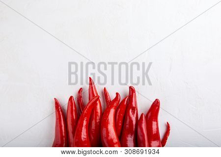 Fire Of Red Pepper On White Background. Top View,  Copy Space, Flat Lay, Close-up. Ramiro Pepper. Fo