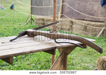 Ancient Wooden Crossbow. Medieval Wooden Crossbow, Middle Ages Weapon - Isolated With Clipping Path