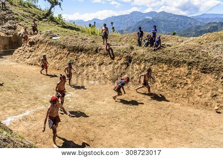 San Andres Semetabaj, Lake Atitlan, Guatemala - November 10, 2018:  Local Indigenous Maya Men Play M
