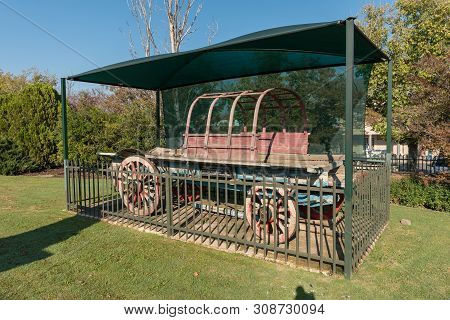 Senekal, South Africa, May 1, 2019: An Historic Ox-wagon At The Dutch Reformed Mother Church In Sene