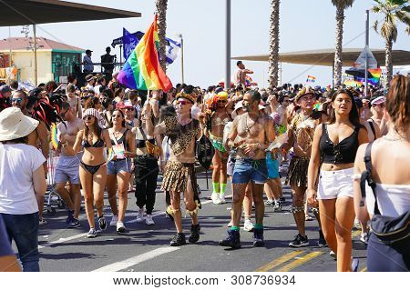 The Annual Parade Lgbt. Gay And Lesbians Walking In The Gay Pride Parade. Parade Of Tolerance. Rainb