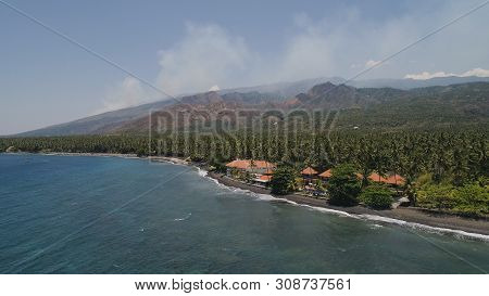 Aerial Seascape Luxury Hotel On Beach Background Mountainss In Tropical Resort. Bali, Indonesia, Tra