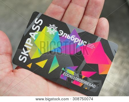 Bright Skipass Card On Human Palm. Russia, Elbrus - June 2019