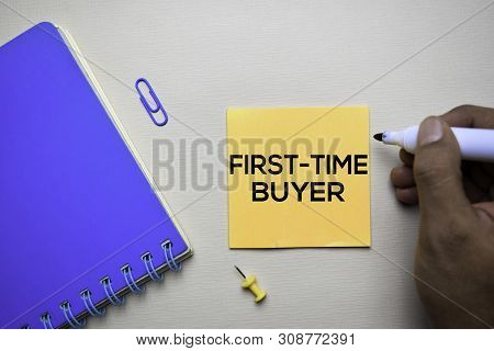 First Time Buyer Text On Sticky Notes With Office Desk Concept